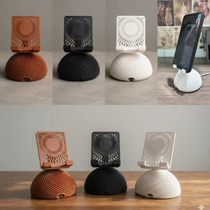 Giá đỡ điện thoại hình vòm lưới in 3D – Thiết kế nghệ thuật, đơn giản, tinh tế, có khe sạc tiện dụng.