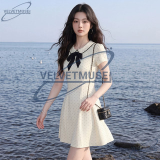 VM-Váy ngắn tay cổ sen đính nơ họa tiết chấm bi chiết eo nhẹ nhàng dáng xòe