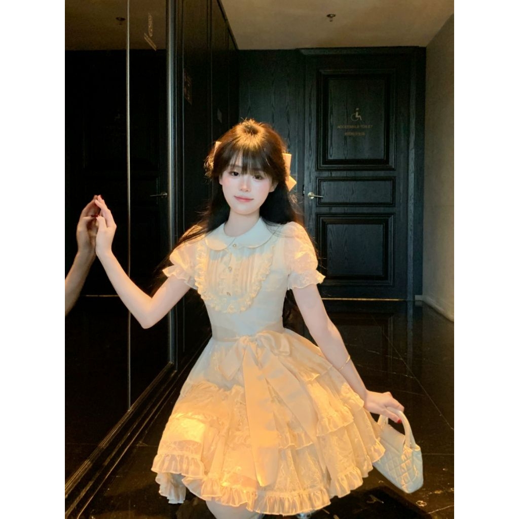 Đầm Tiểu Thư Màu Kem Tay Bồng Phối Ren Nơ Eo Dáng Xoè Babydoll Memeboutique [TLV30]