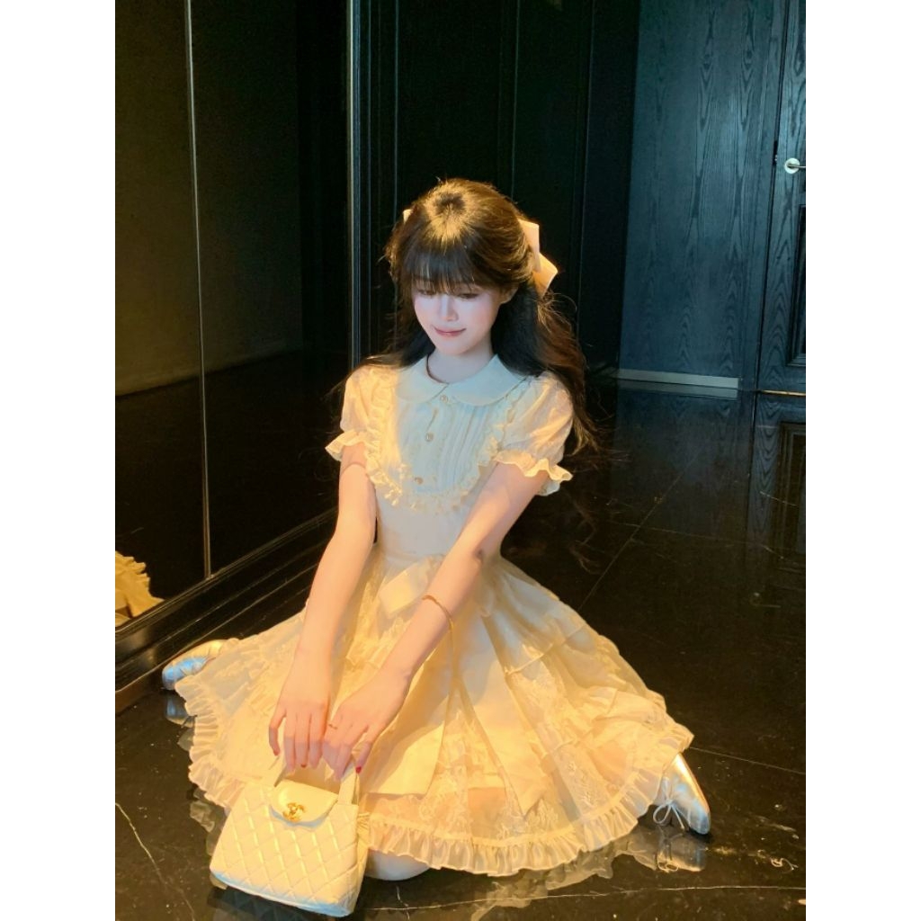 Đầm Tiểu Thư Màu Kem Tay Bồng Phối Ren Nơ Eo Dáng Xoè Babydoll Memeboutique [TLV30]