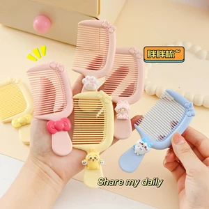 Lược nhựa mini bỏ túi đính charm nơ Kitty siêu bền MUNSTORE LUOCKI13