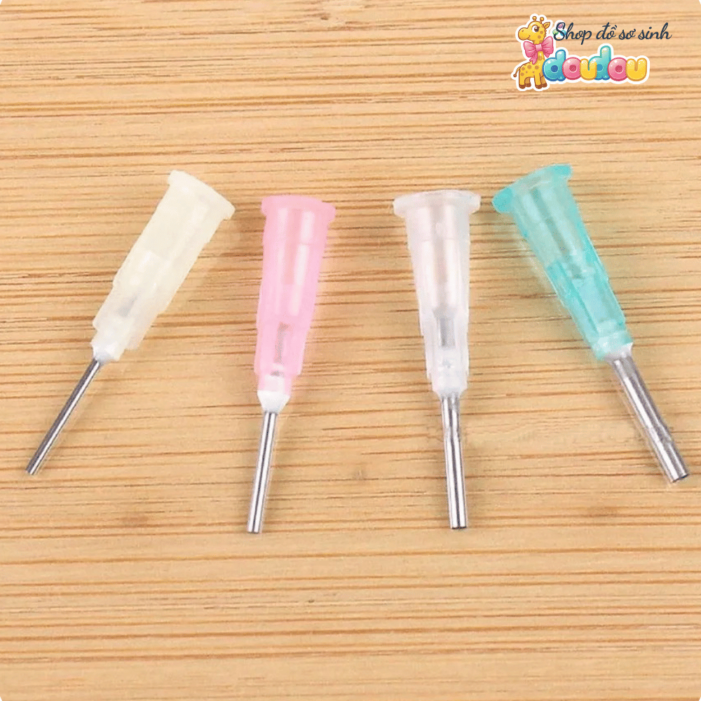 Đục lỗ núm ti bình sữa cho bé, dùng mọi loại núm ti Doudou A03