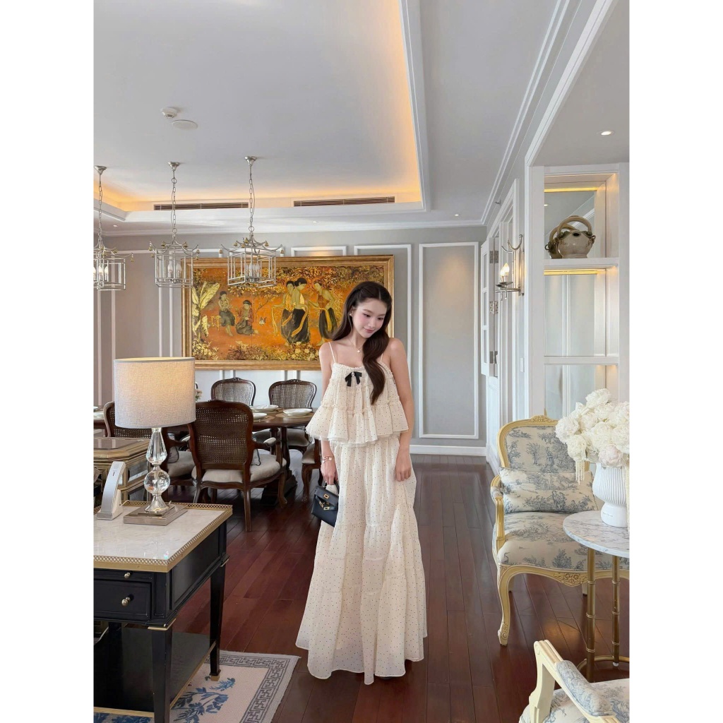 NH CLOTHER -Đầm dài hai dây chất voan tơ kem phối chấm bi đen xèo tầng phối nơ trước ngực