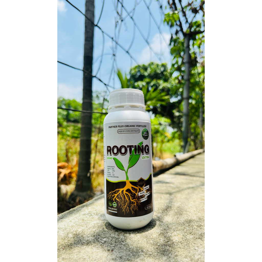 Phân bón hữu cơ Rooting chai 500ml : Kích rễ thần tốc , cải tạo đất tới xốp