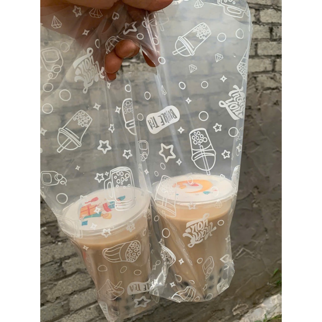 1 KG Túi Trà Sữa 2ly có in (75-80 túi/1kg)-đựng 2 cốc trà sữa-kích thước 32x32.Hàng nguyên sinh sáng bóng
