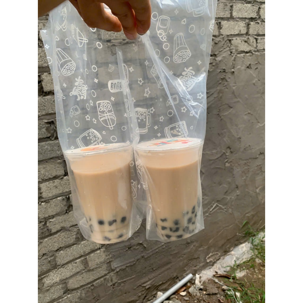 1 KG Túi Trà Sữa 2ly có in (75-80 túi/1kg)-đựng 2 cốc trà sữa-kích thước 32x32.Hàng nguyên sinh sáng bóng