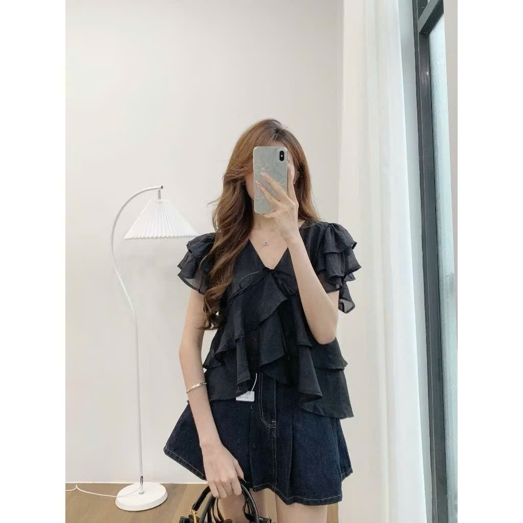 Áo kiểu nữ đũi tơ nhún bèo tầng vạt chéo thắt nơ ngực áo blouse tay cánh tiên dáng suông babydoll HCOM27319