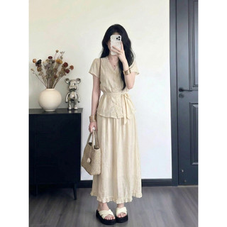 Set bộ nữ áo kiểu thêu hoa ren thắt nơ eo phối chân váy maxi suông dài màu trắng kem HCOM27141