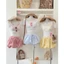 Set bikini 3 món Loại 1 thiết kế áo bra có mút ngực dày kèm áo thun trắng mix chân váy bí chấm bi siêu xin