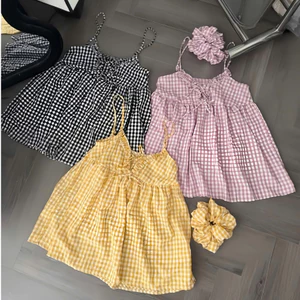 Đầm Baby doll 2 dây chất kate xốp kèm cột tóc thời trang trẻ trung