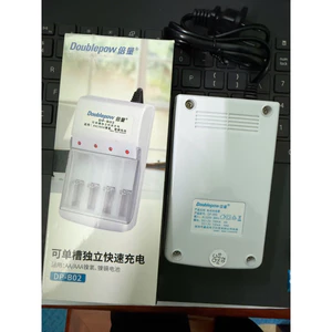 Bộ sạc 4 pin AA ( pin 2A) loại sạc Douplepow 4 cổng tiện lợi dùng cho mic karaoke, đồ chơi, máy ảnh