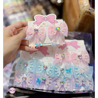 Set 2 kẹp nơ voan đính charm tua rua nhiều màu cho bé