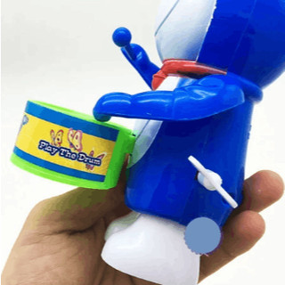 Đồ Chơi Vặn Cót Đánh Trống Lắc Lư Cho Bé Siêu Vui Nhộn - Mèo Kitty, Doraemon, Người Nhện,...