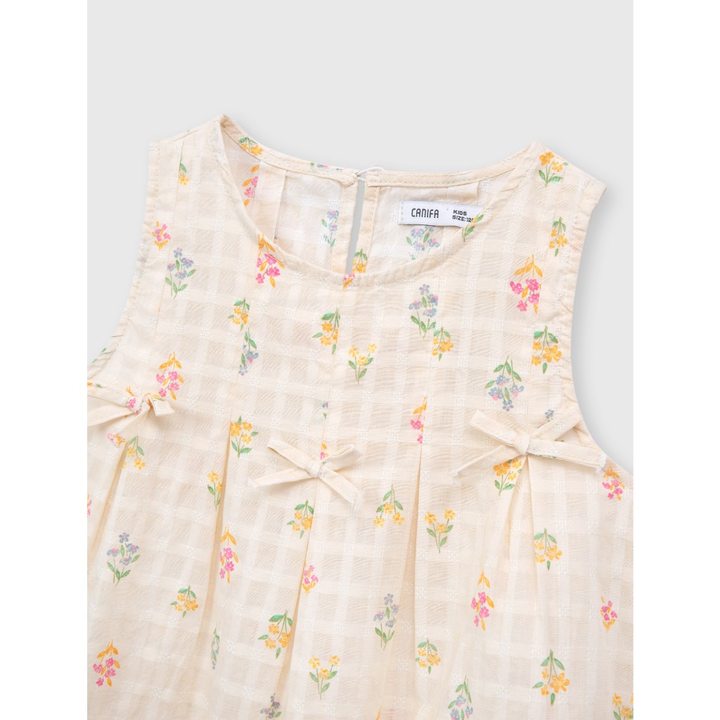 Áo kiểu bé gái CANIFA dáng babydoll không tay đính nơ in họa tiết 1TO26S001