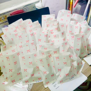 TÚI GIẤY ( Nơ trái tim ) trang trí gói hàng , tặng quà đựng phụ kiện 12x17 cm