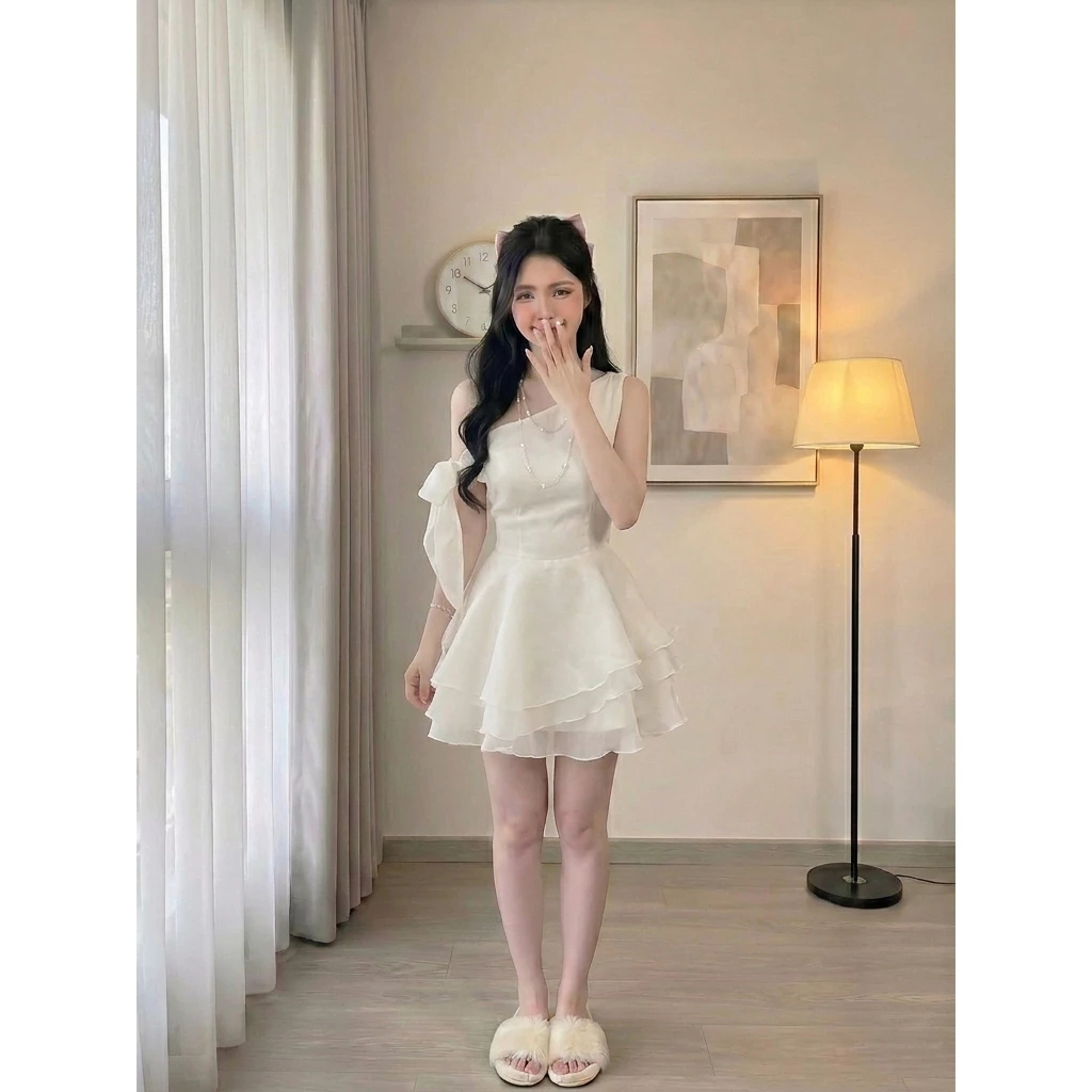 Đầm lệch vai phối nơ tay dáng ngắn xòe bồng tơ organza váy trắng kem phong cách nàng thơ tôn dáng HCOM25853