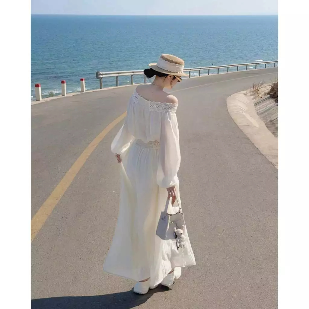 Outfit đi biển nữ set áo kiểu dệt hoa nổi kèm chân váy maxi xuyên thấu nhẹ quyến rũ phong cách Hàn Quốc HCOM27256