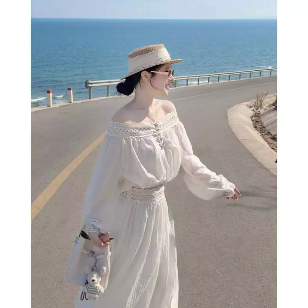Outfit đi biển nữ set áo kiểu dệt hoa nổi kèm chân váy maxi xuyên thấu nhẹ quyến rũ phong cách Hàn Quốc HCOM27256