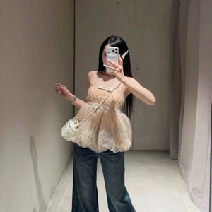 Áo 2 dây lưới nơ đính cườm bí phồng