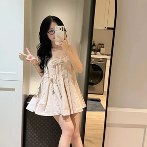 Đầm 2 dây babydoll xếp li xoè nơ