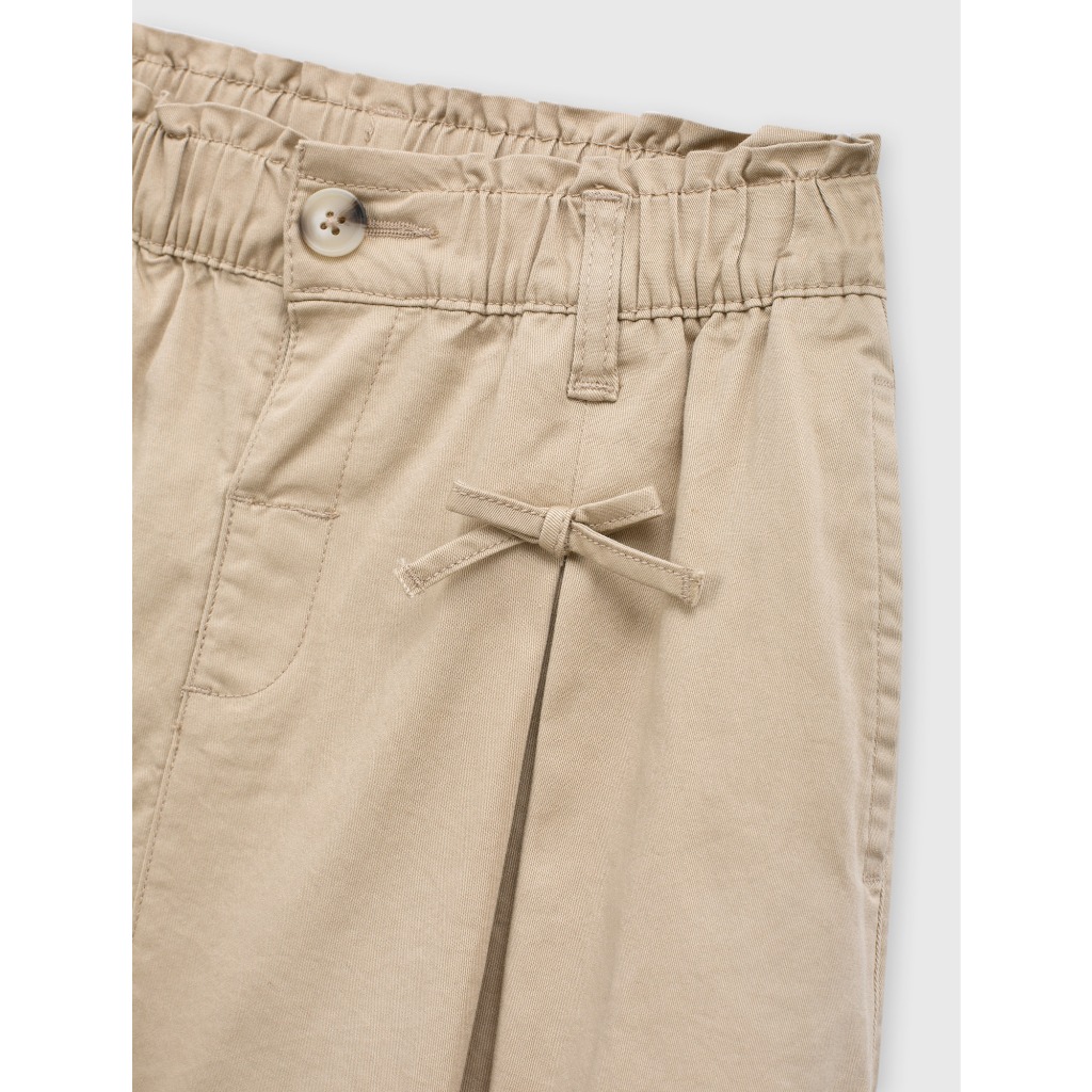 Quần short bé gái CANIFA quần giả váy xếp ly đính nơ cạp chun co giãn 1BS26S001