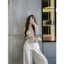 ”Sakai Set” Set áo yếm sát nách dáng peplum xoè xẻ tà thắt dây lưng kèm quần suông ống rộng trẻ trung thanh lịch