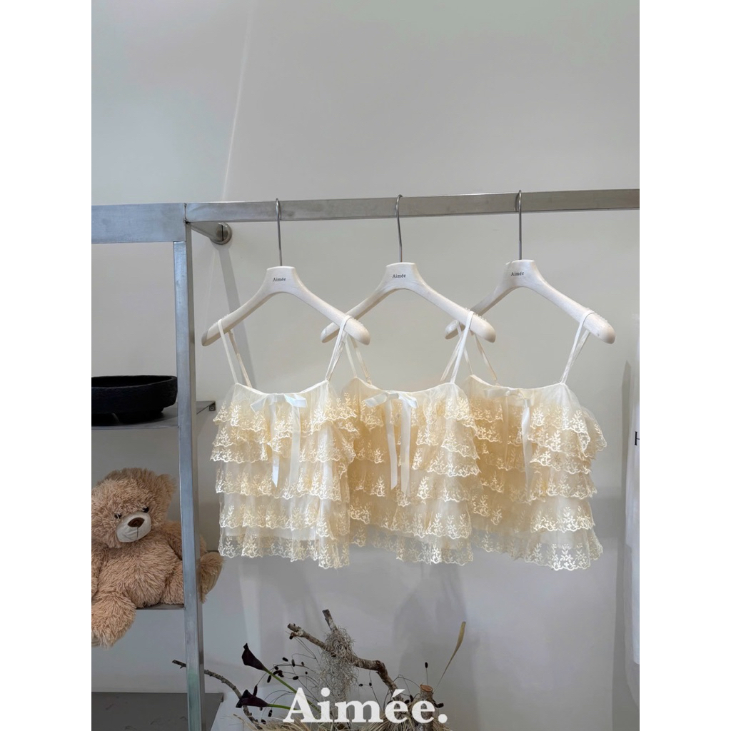 Áo 2 dây ren tầng đính nơ ngực bánh bèo
