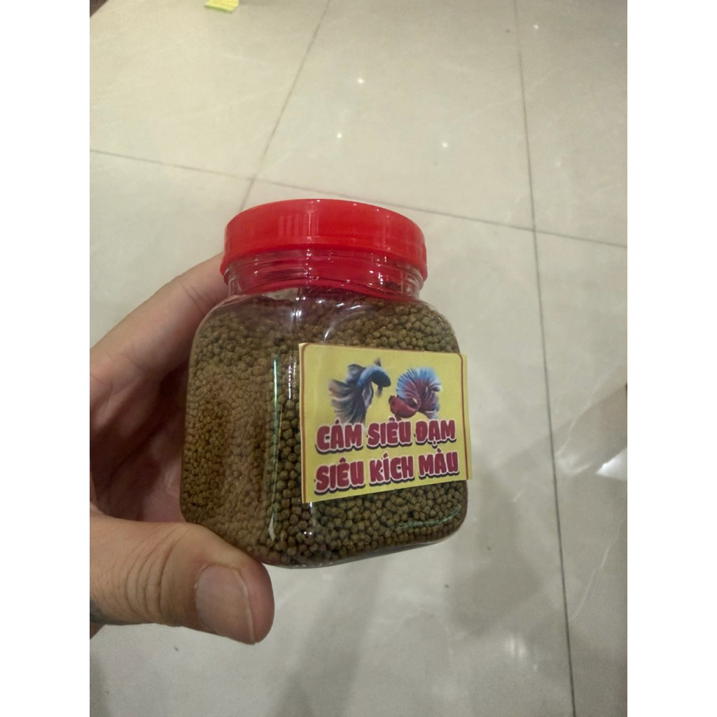 100g cám 1ml độ đạm 40 dành cho cá 7 màu, cá chép cá koi cá rô giống