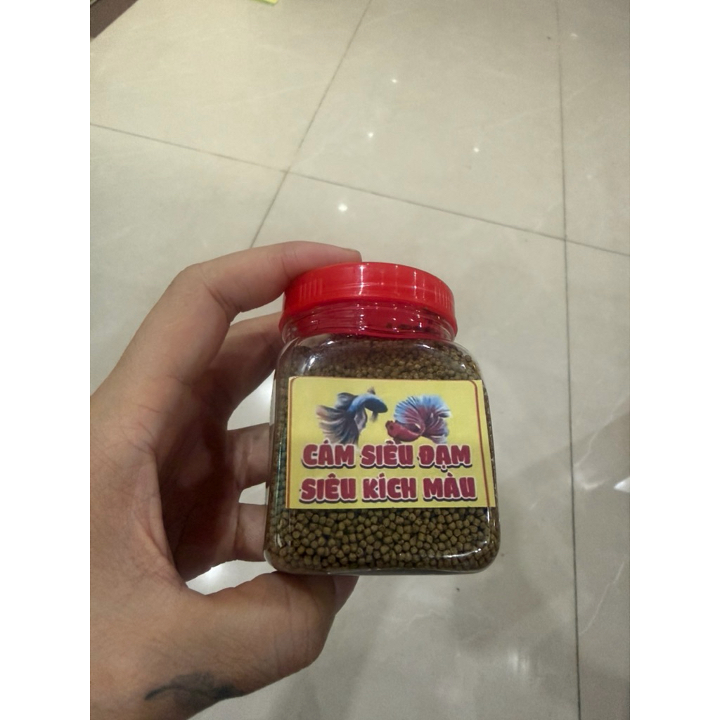 100g cám 1ml độ đạm 40 dành cho cá 7 màu, cá chép cá koi cá rô giống