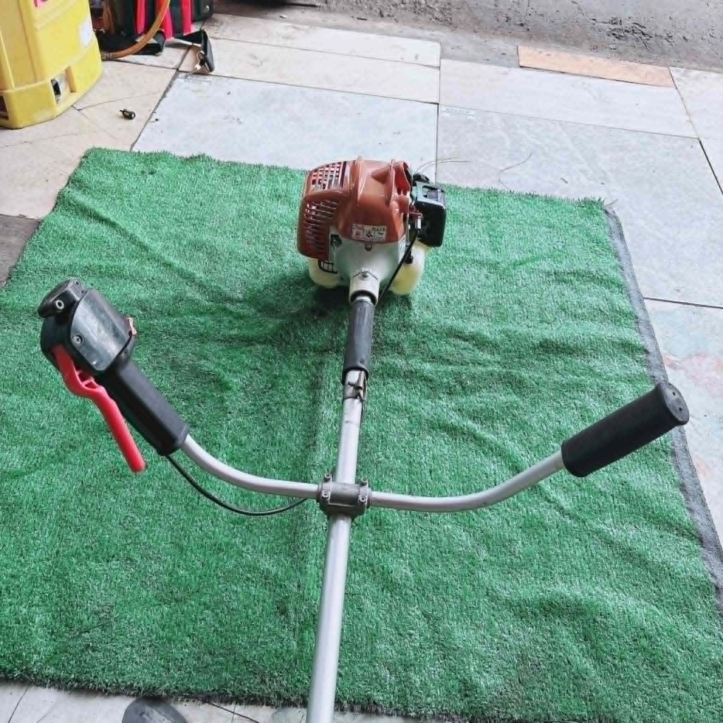 (25) Máy cắt cỏ MARUYAMA 26, bãi nhật, 2 thì, nòng 34 li, 26cc, trợ lực lớn, bền lợi xăng, nhẹ 4,5kg