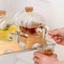 BÌNH THỦY TINH CÓ VÒI RÓT KÈM GIÁ ĐỠ GỖ – TIỆN LỢI, SANG TRỌNG CHO MỌI GIA ĐÌNH