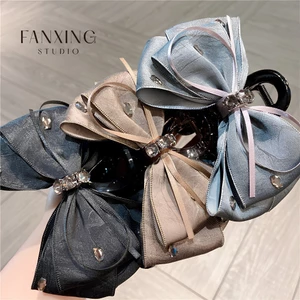 Kẹp tóc càng cua cao cấp Fanxing NV05 nơ lụa satin phối ruy băng tua rua đính đá pha lê sang trọng kiểu dáng tiểu thư
