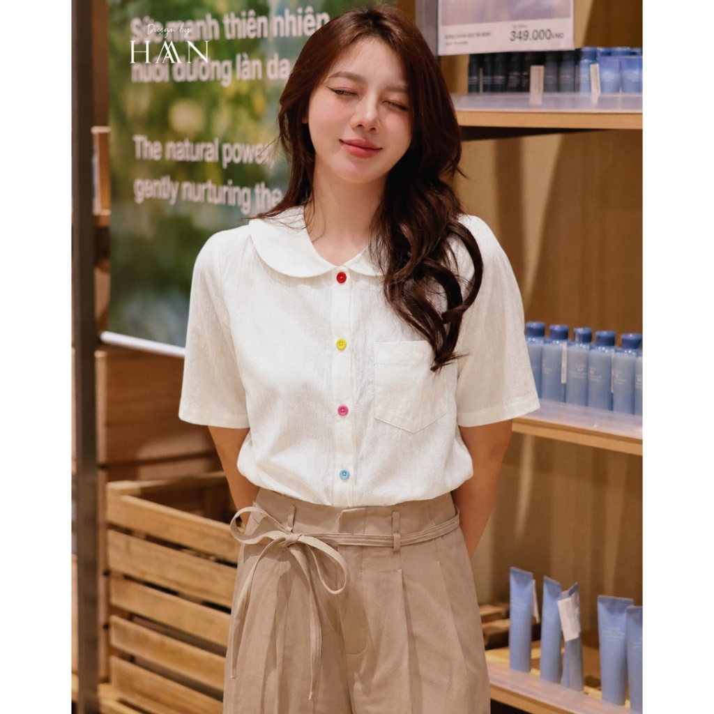 Áo Sơ Mi Nữ Ngắn Tay Cổ Sen Màu Trắng Kem Mix Cúc Màu, Vải Thô Ướt Nhăn HAAN Design SM2655