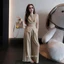 Set bộ sát nách GUMIN thiết kế áo ba lỗ xoắn eo phối kèm quần suông dài ống rộng, Set đồ nữ vintage đi biển sang trọng