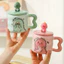 Cốc sứ Ly sứ có nắp hình Khủng Long 380ml đi kèm có muỗng chất lượng cao cấp.
