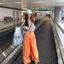 Set áo ba lỗ khoá có mũ quần suông cam