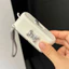 HỘP ĐỰNG TĂM CHỈ NHA KHOA MINI – GỌN GÀNG, VỆ SINH, TIỆN LỢI Kèm Stick Hình Chó Gấu