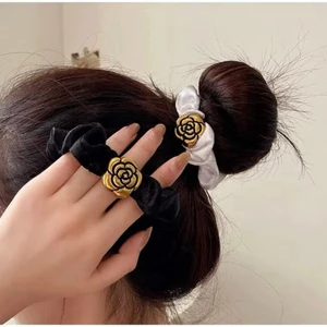 Buộc tóc hoa trà & co 4 lá xinh iu