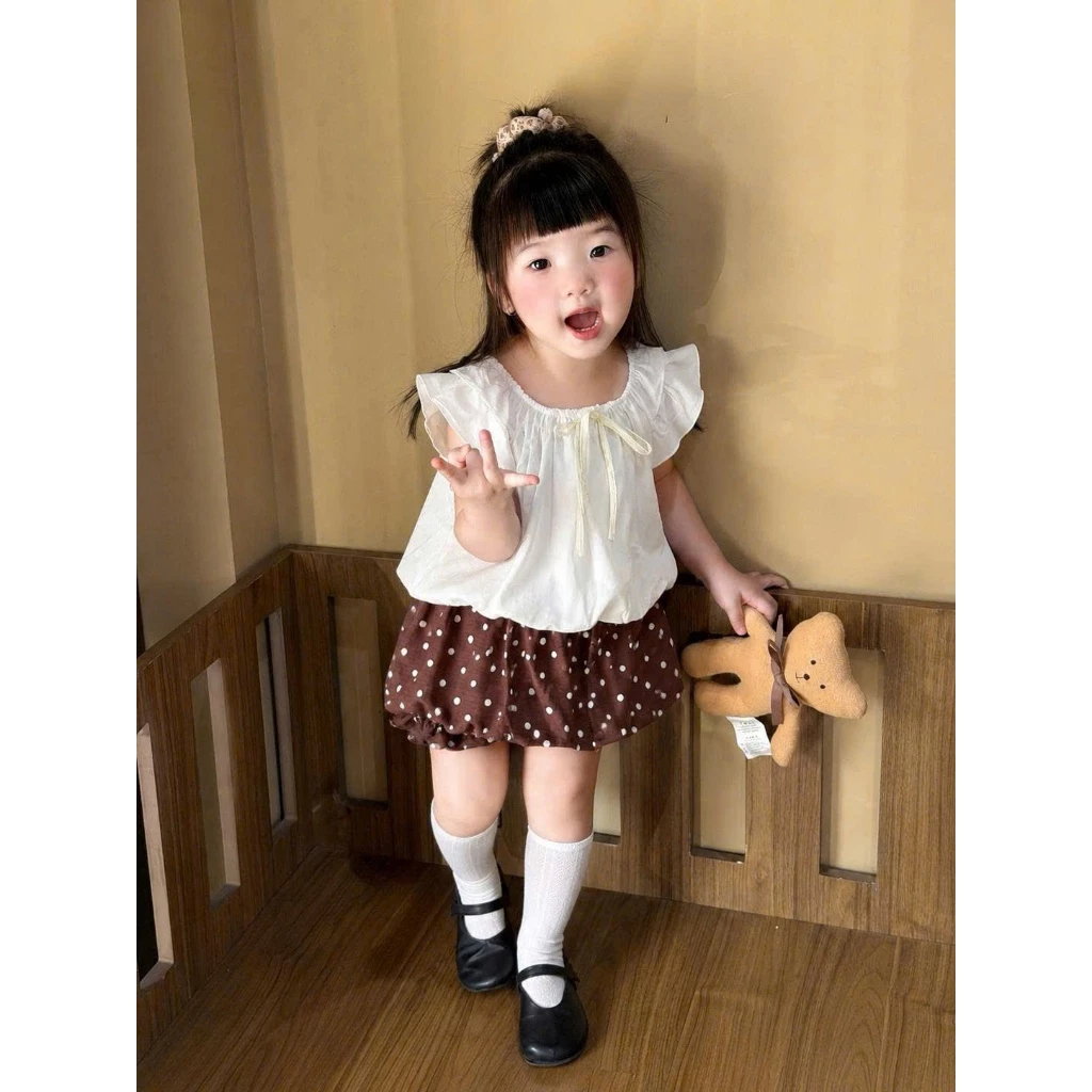 Set Áo Tay Bèo Phối Chân Váy Bí Chấm Bi Bé Gái Bộ Hè Bé Gái Phối Nơ Phong Cách Hàn Quốc Đáng Yêu