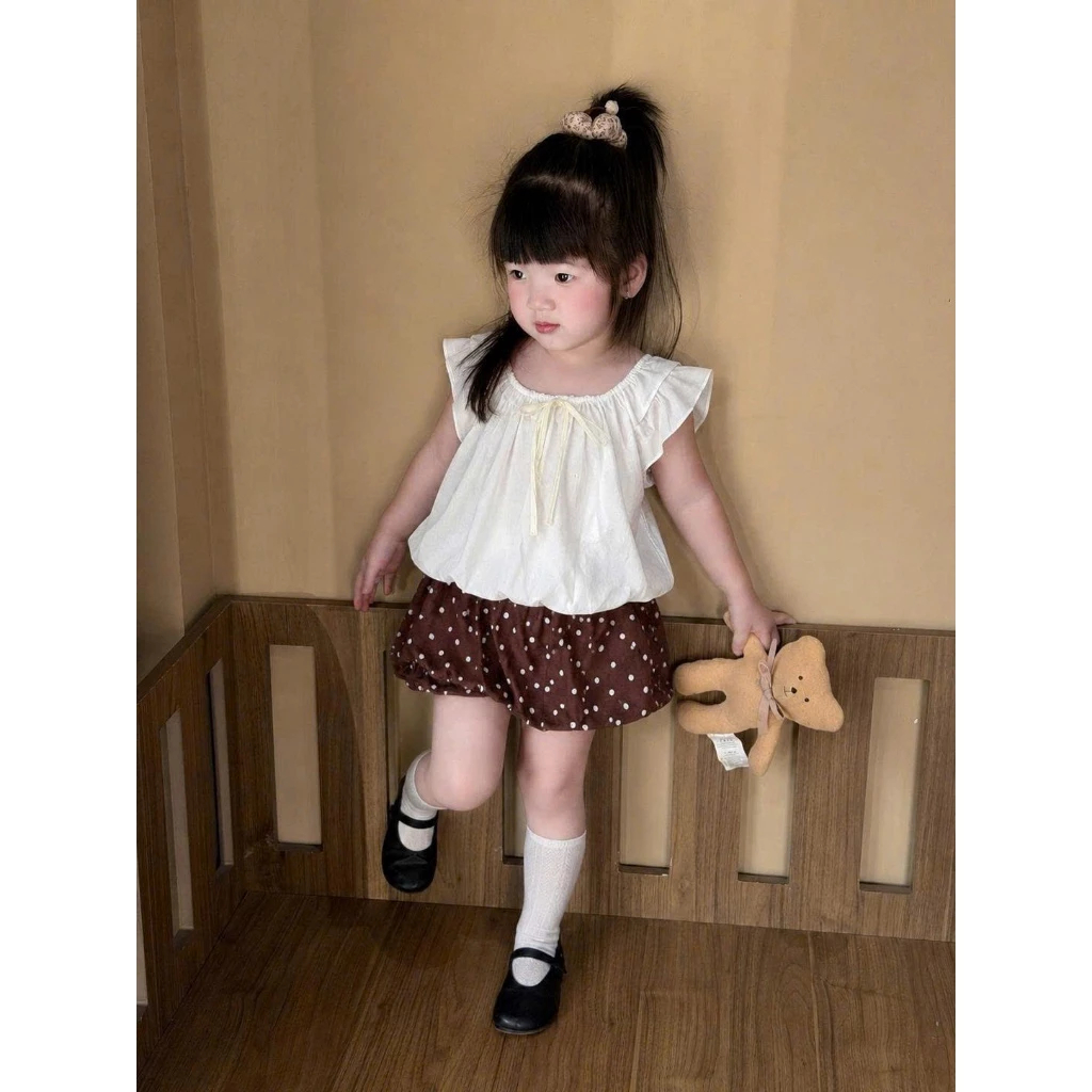 Set Áo Tay Bèo Phối Chân Váy Bí Chấm Bi Bé Gái Bộ Hè Bé Gái Phối Nơ Phong Cách Hàn Quốc Đáng Yêu