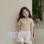 Áo thun tăm ngắn tay cổ sen cách điệu cho bé gái mặc mùa hè