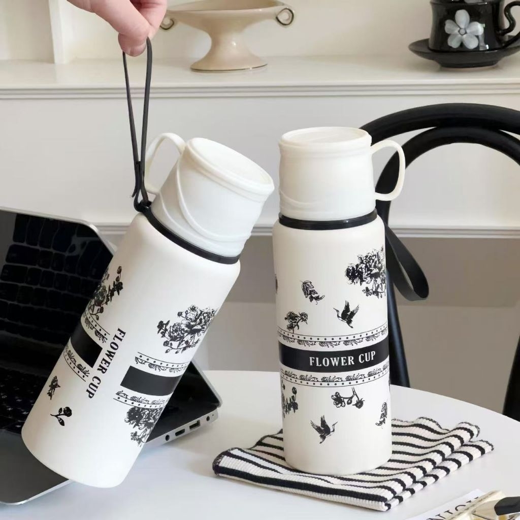 bình giữ nhiệt trắng hoa mộc trà ,dung tích 800ml