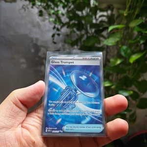 Thẻ Trainer Glass Trumpet 260/217 Ultra Rare