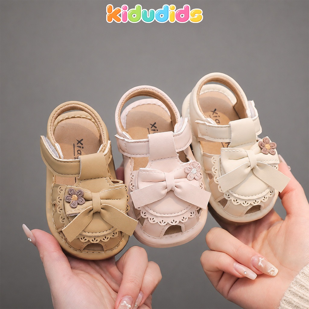 Dép Trẻ Em Tập Đi Có Còi Kidudids Nơ Hoa Cao Cấp Sandal Mềm Nhẹ Chống Trơn Size 16-20
