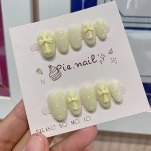 504. nailbox thạch vàng nhạt charm chữ thập