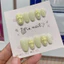504. nailbox thạch vàng nhạt charm chữ thập