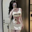 Đầm 2 dây ôm body ngắn in hình báo hồng , chất thun zip lụa