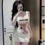 Đầm 2 dây ôm body ngắn in hình báo hồng , chất thun zip lụa