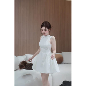 Đầm sát nách buộc nơ lưng mai phương bùi