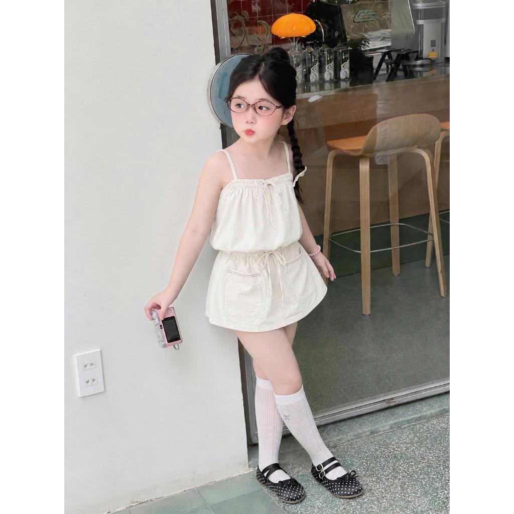 Váy Jump hai dây bé gái liền thân dáng phồng có túi, eo chun rút nơ phong cách Hàn Quốc S10